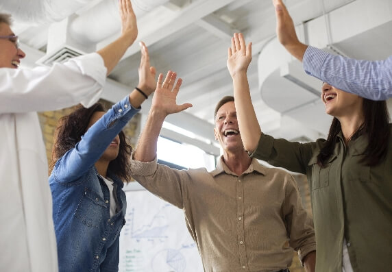 people-smiling-while-conference-rom